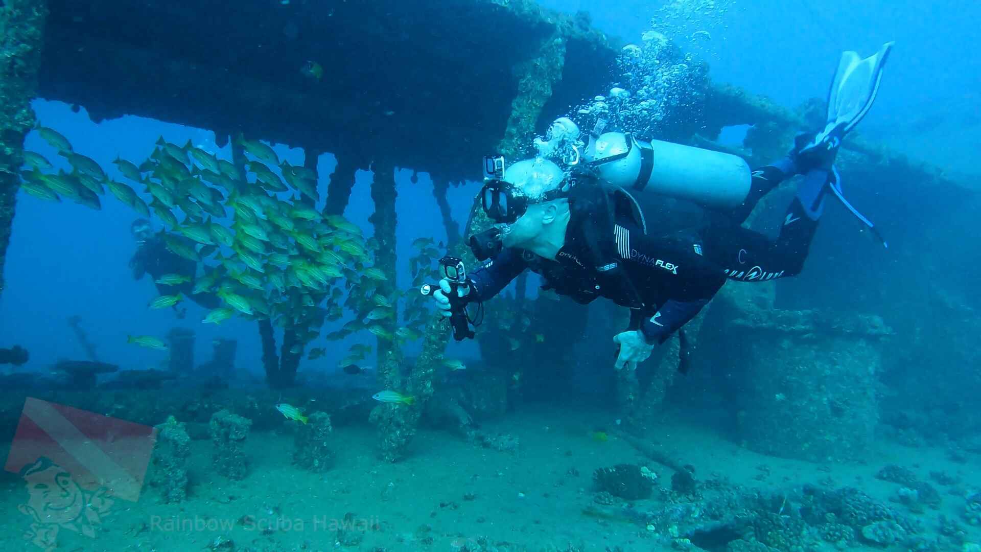 Scuba diver exploring the YO-257 wreck